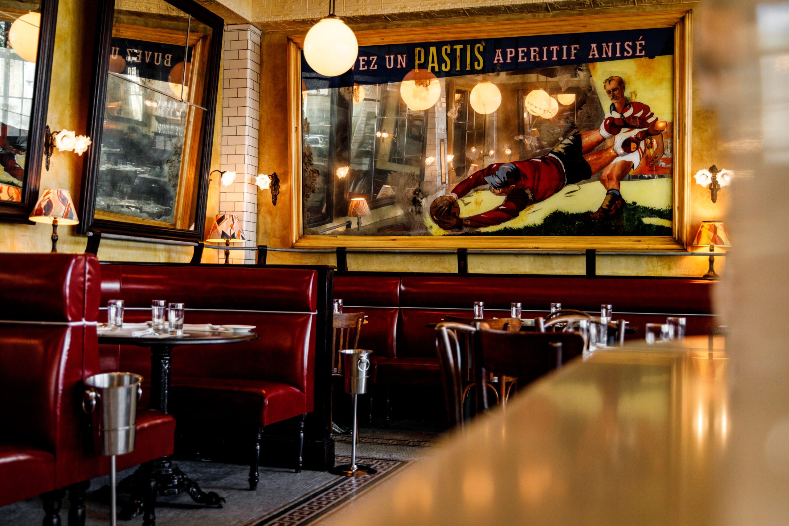 Pastis Interior, red banquettes. 